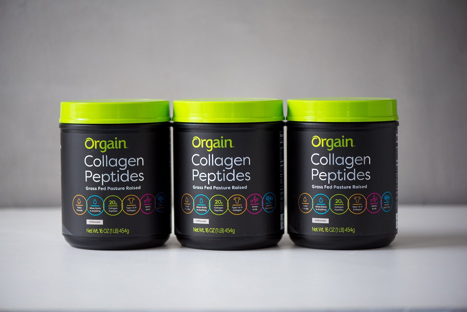 orgain collagen peptides products on a table next to each other