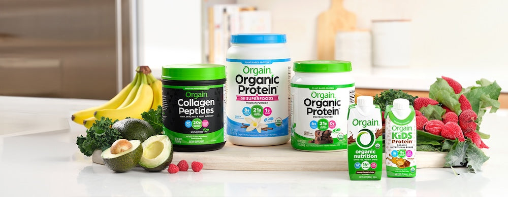 Several orgain products on a kitchen table
