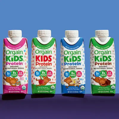 orgain kids shakes on a blue purple background