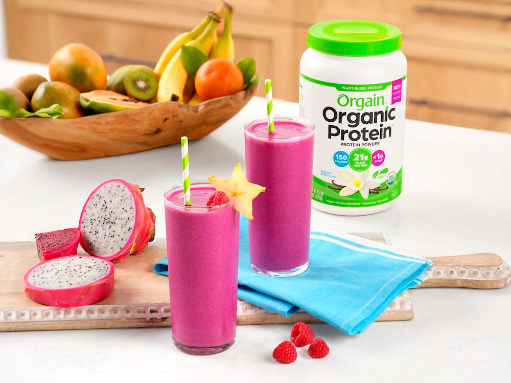 dragon fruit smoothie next to orgain vanilla protein powder