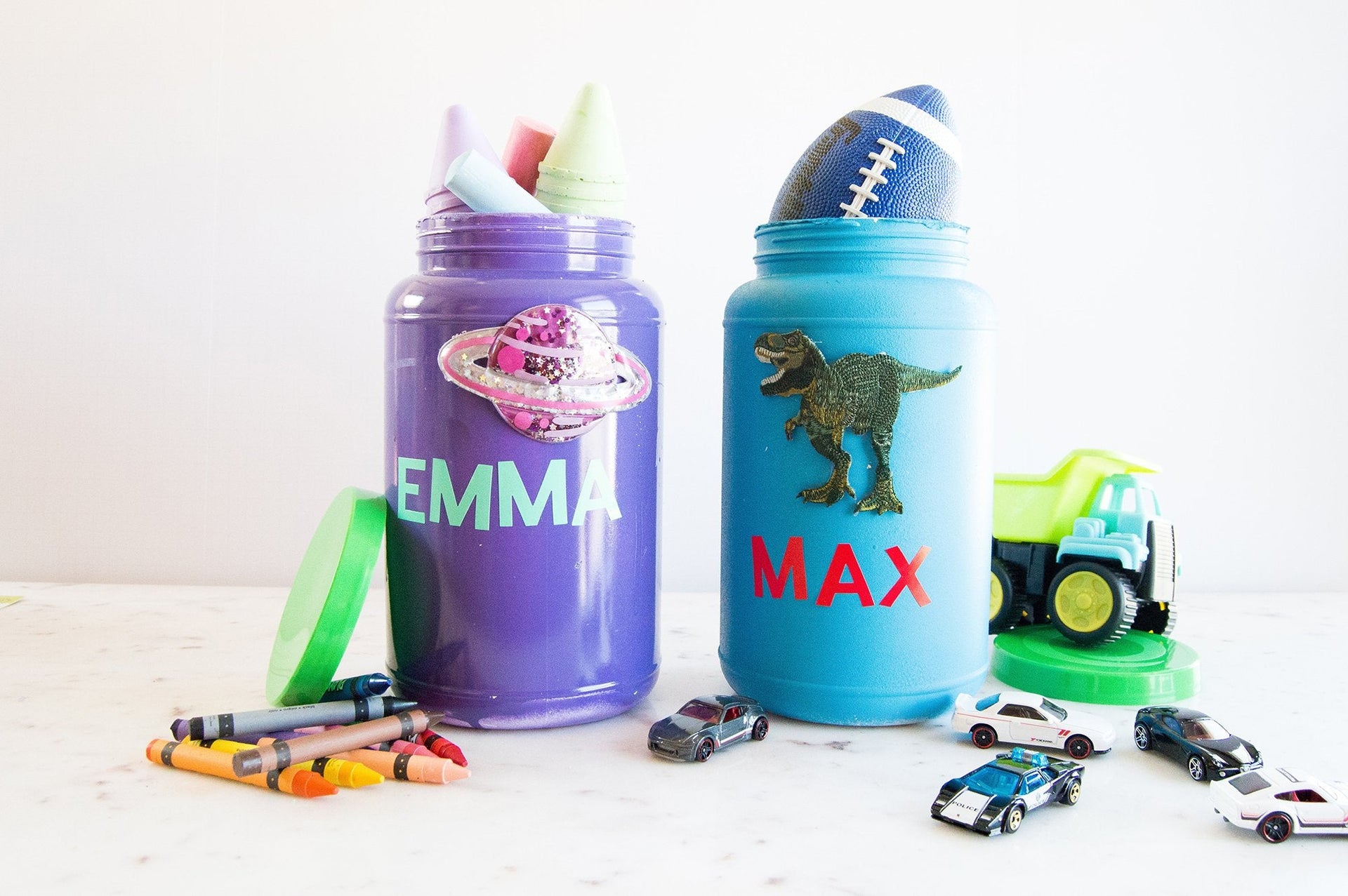 Two protein powder tubs upcycled as toy bins