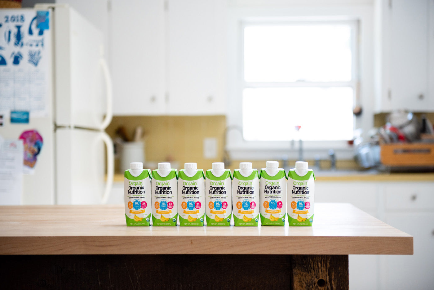 lineup of 8 orgain organic nutrition shakes