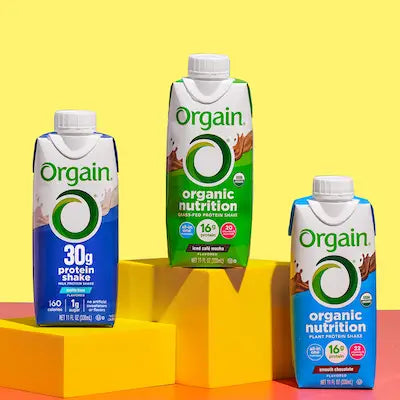 orgain ready to drink shakes on a yellow background
